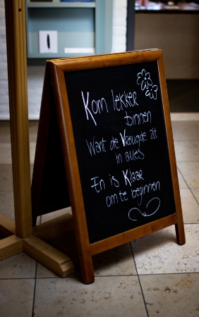 Welkomstbord in de hal